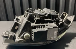 Фара ксенон левая для BMW 1er 2009 года на фотографиях