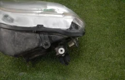 Фара ксенон левая для Renault Logan 2008 года на фотографиях