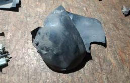 Подкрылок передний левый для Volkswagen Passat 2010 года на фотографиях