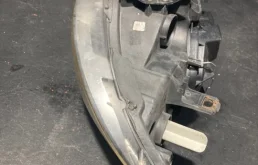 Фара ксенон левая для BMW 1er 2009 года на фотографиях