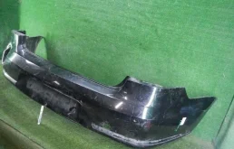 Бампер задний для Volkswagen Passat 2014 года на фотографиях