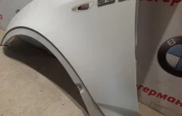 Крыло левое для BMW X3 2007 года на фотографиях