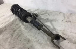 Амортизатор передний левый для BMW 5er 2012 года на фотографиях