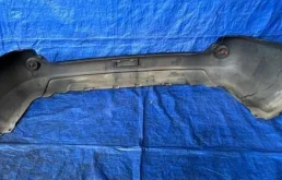 Бампер для Nissan X-Trail 2005 года на фотографиях