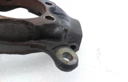 Кулак поворотный левый для Nissan X-Trail 2014 года на фотографиях