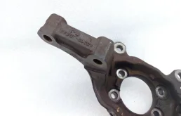 Кулак поворотный левый для Nissan X-Trail 2012 года на фотографиях