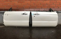 Двери для Subaru Forester 2004 года на фотографиях