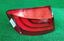 Фонарь левый для BMW 5er 2013 года на фотографиях