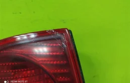 Фонарь левый для Volkswagen Passat 2000 года на фотографиях