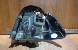 Фонарь подсветки номера правый для Volkswagen Passat 2010 года на фотографиях