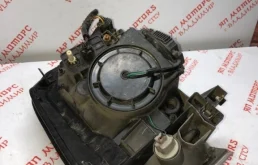 Фара ксенон левая для Nissan X-Trail 2004 года на фотографиях