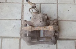 Суппорт передний левый для Volkswagen Passat на фотографиях