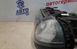 Фара ксенон левая для BMW X3 2008 года на фотографиях