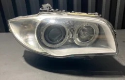 Фара ксенон левая для BMW 1er 2009 года на фотографиях