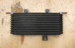 Радиатор АКПП для Nissan X-Trail 2013 года на фотографиях