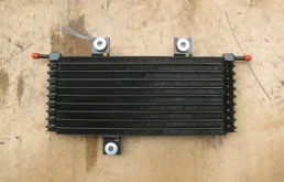 Радиатор АКПП для Nissan X-Trail 2013 года на фотографиях