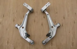 Рычаг передний левый нижний для Nissan X-Trail 2001 года на фотографиях