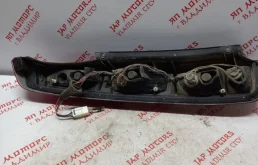 Фонарь внешний правый для Nissan X-Trail 2005 года на фотографиях