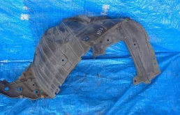 Подкрылок передний левый для Nissan X-Trail 2011 года на фотографиях