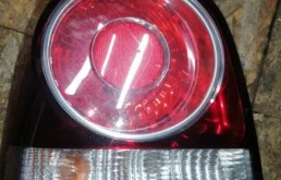 Фонарь левый для Volkswagen Polo 2006 года на фотографиях