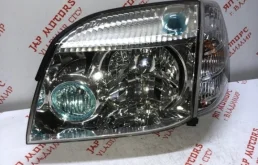 Фара ксенон левая для Nissan X-Trail 2004 года на фотографиях