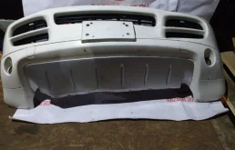 Бампер передний для Porsche Cayenne 2004 года на фотографиях