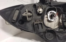 Фара левая для BMW 1er 2004 года на фотографиях