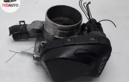 Дроссельная заслонка для Volkswagen Passat 2000 года на фотографиях