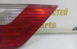 Фонарь внутренний левый для BMW X3 2009 года на фотографиях