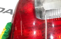 Фонарь левый для Skoda Octavia 2009 года на фотографиях