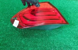 Фонарь левый для BMW 5er 2013 года на фотографиях