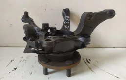 Кулак поворотный левый для Nissan X-Trail 2001 года на фотографиях