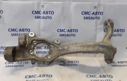 Кулак поворотный левый для Audi A6 2008 года на фотографиях