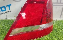 Фонарь внешний левый для Volkswagen Passat 2012 года на фотографиях