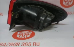 Фонарь левый для Volkswagen Tiguan 2009 года на фотографиях