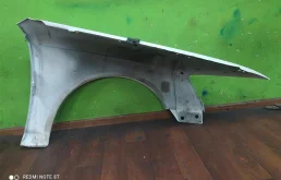 Крыло левое для Audi A6 2009 года на фотографиях