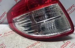 Фонарь левый для Suzuki SX4 2011 года на фотографиях