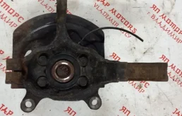 Кулак поворотный левый для Nissan X-Trail 2012 года на фотографиях