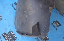 Подкрылок передний левый для Volkswagen Passat 2010 года на фотографиях