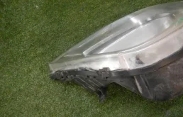 Фара ксенон левая для Renault Logan 2008 года на фотографиях