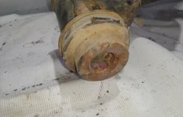 Усилитель переднего бампера для Nissan X-Trail 2005 года на фотографиях