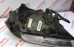 Фара ксенон левая для Nissan X-Trail 2004 года на фотографиях