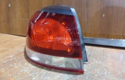 Фонарь подсветки номера правый для Volkswagen Passat 2010 года на фотографиях