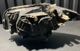 Фара ксенон левая для BMW 1er 2009 года на фотографиях