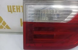 Фонарь внутренний левый для BMW X3 2009 года на фотографиях