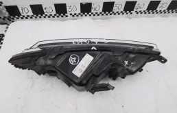 Противотуманка (ПТФ) передняя левая для Skoda Octavia 2014 года на фотографиях