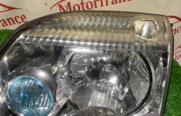 Фара левая для Nissan X-Trail 2000 года на фотографиях