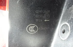 Фонарь подсветки номера правый для Volkswagen Passat 2010 года на фотографиях