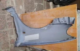 Крыло правое для Nissan Almera 2006 года на фотографиях