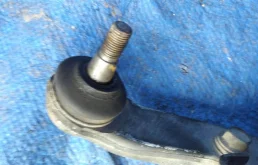 Рычаг передний левый верхний для Nissan X-Trail 2010 года на фотографиях